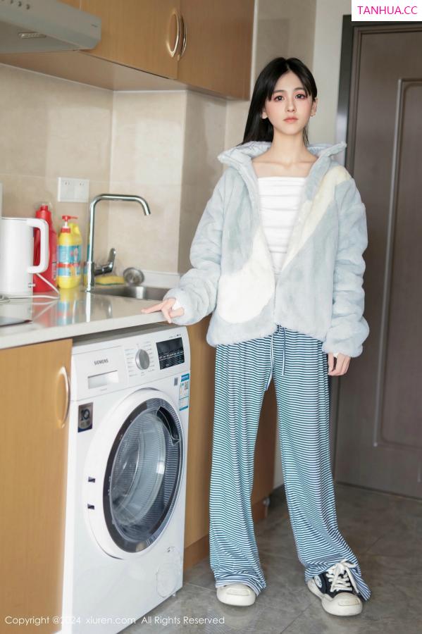   [XiuRen]高清写真图 2024.12.16 No.9605 奶芙乔乔 美腿黑丝第23张图片
